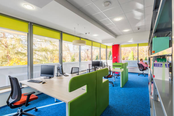 istock Colorful library interior with desks 638823240
