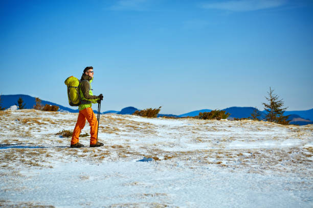 istock hiker in the mountains 638824158