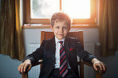 Portrait of a cute little business man or politician