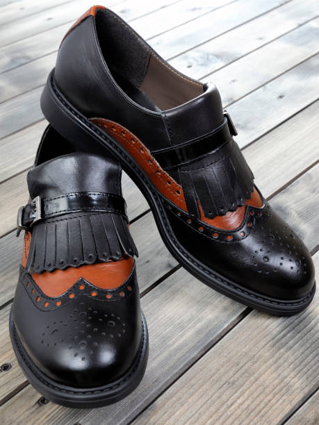istock Women's shoes on old wooden table. 638826810