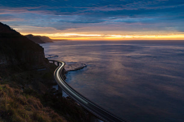 istock Sea Cliff Bridge on sunrise with moving traffic 638829050