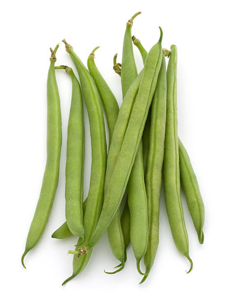 istock Green beans handful isolated on white background cutout 638831998