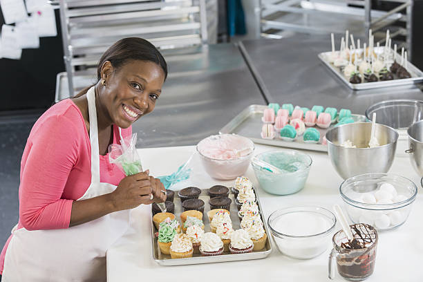 istock African American woman working in bakery kitchen 638834034