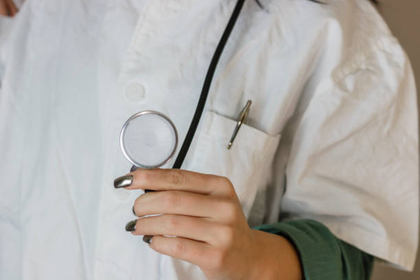 istock Female doctor with stethoscope, isolated on white 638834878