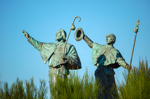 Statue of two pilgrims on the Monte do Gozo in the outskirts of Santiago de Compostela, Galicia, Spain