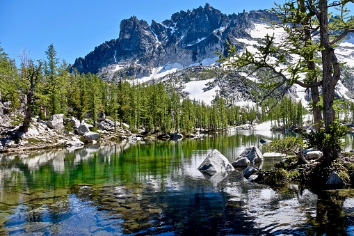 A portion of Lake Helen with Lassen Peak in the background. Both are within Lassen Volcanic National Park in northern California.