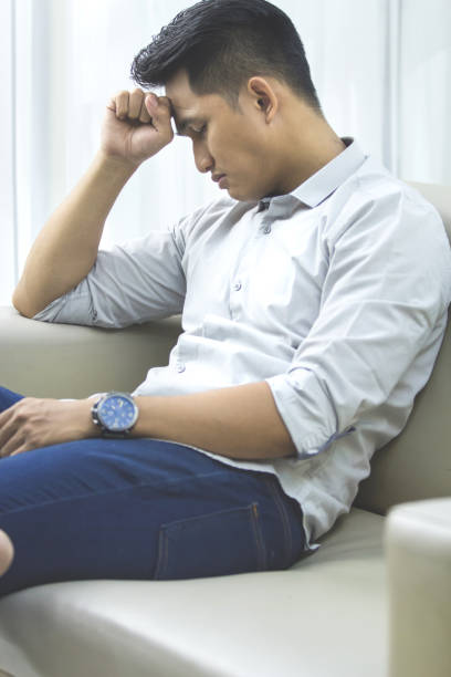 istock Young man with problems and stress at home 638840220