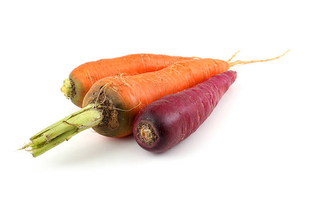 istock Red and orange carrots 638840336