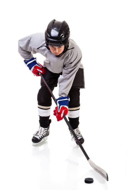 istock Junior Ice Hockey Player Isolated on White Background 638840462