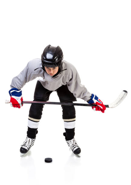 istock Junior Ice Hockey Player Isolated on White Background 638840478