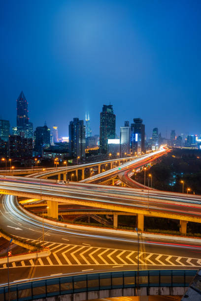 istock urban traffic with cityscape 638843356