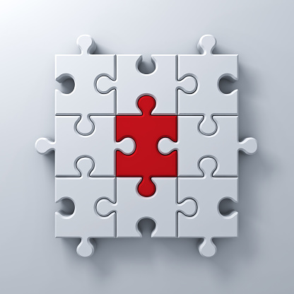One red jigsaw puzzle piece stand out from the white crowd different concept on white wall background with shadow 3D rendering.