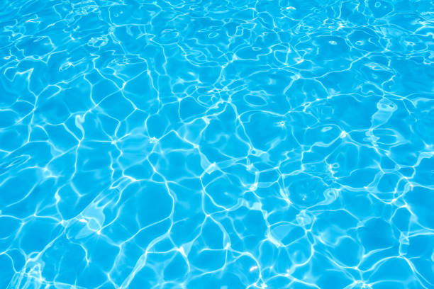 istock Blue and bright ripple water and surface in swimming pool 638849682