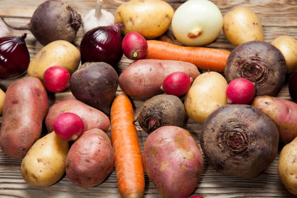 istock Vegetables. Potatoes, carrots, onions, beets and radishes 638850134