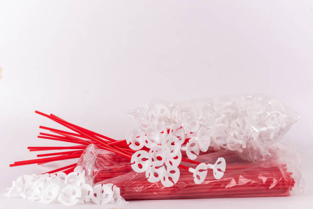 pre-packed colorful plastic straws stock photo