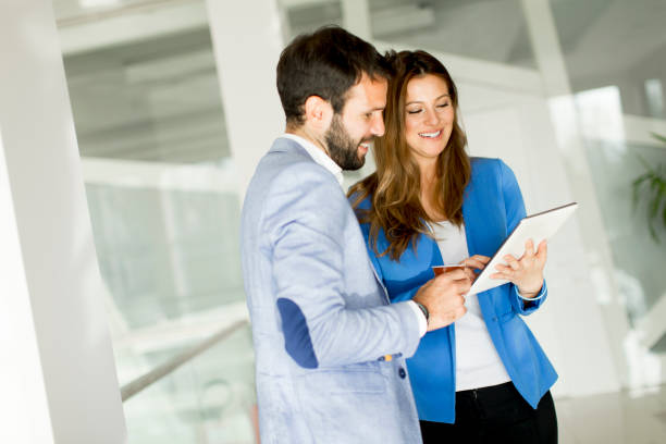 istock Business couple with tablet 638852100