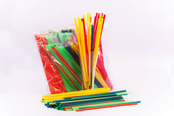 pre-packed colorful plastic straws stock photo