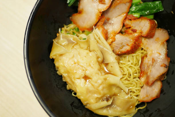 istock Cantonese Hong Kong noodle with shrimp dumpling and roasted pork 638852840