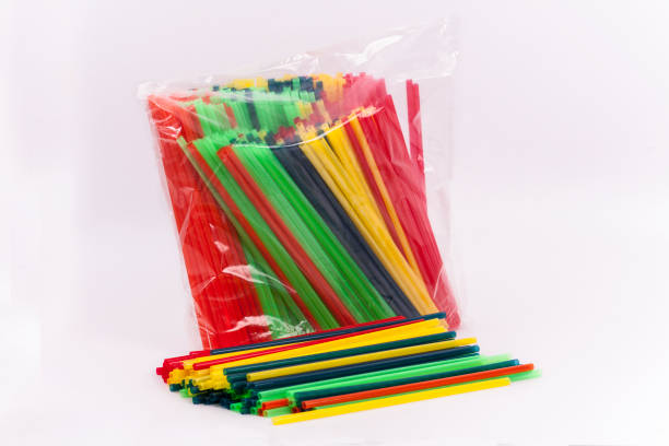 pre-packed colorful plastic straws stock photo