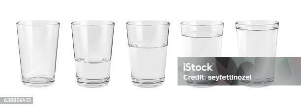 Empty Water Glass And One Glass Of Water Stock Photo - Download Image Now - Drinking Glass, Water, Cup