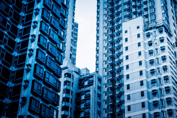 High rise residential buildings under the blue sky