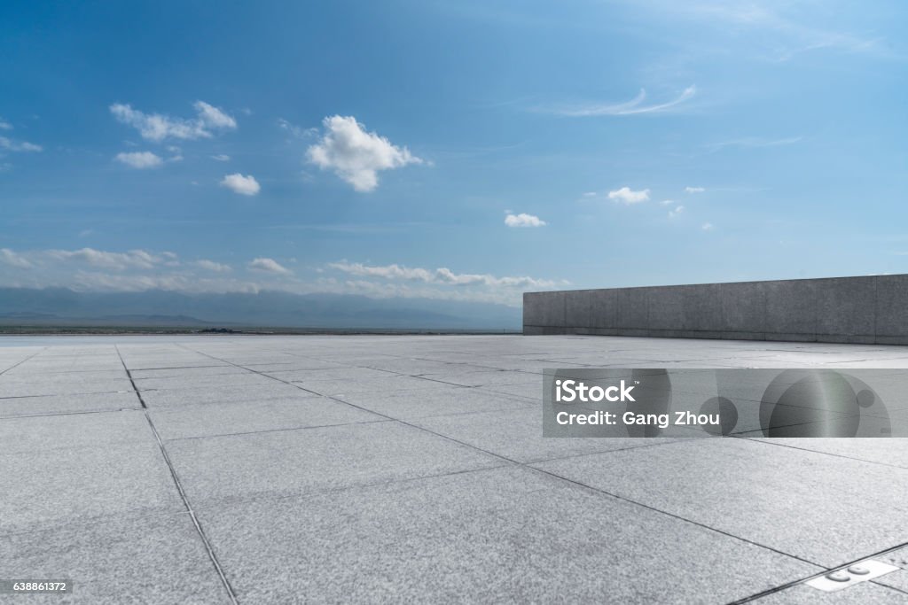 Professional use auto advertising backplate empty pavement with sky at sunny day,digital composite. Rooftop Stock Photo