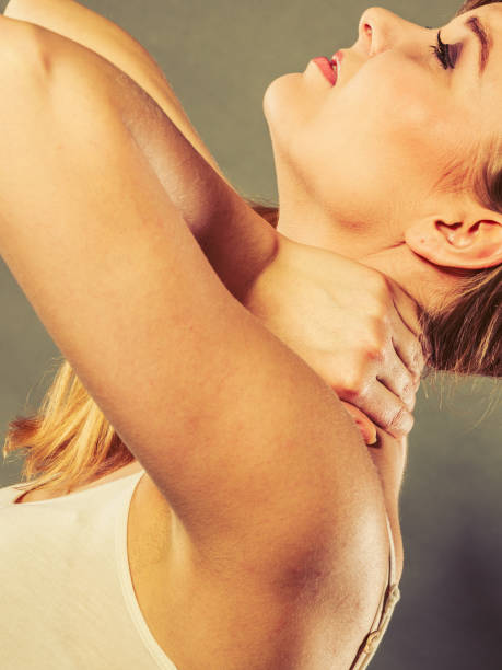 istock Woman suffering from neck pain 638861536