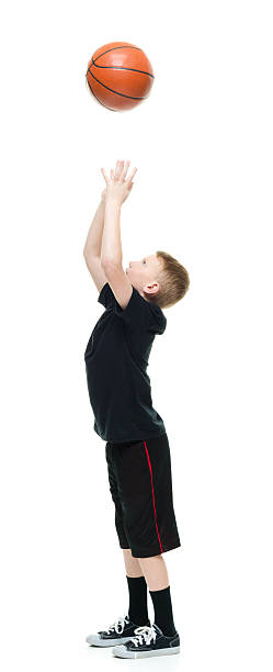 istock Little boy playing basketball 638863550