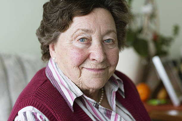 istock smiling senior woman portrait 638864650