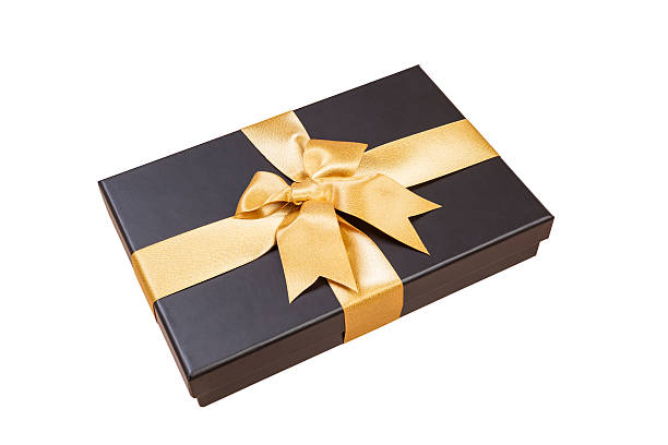 istock black gift box with gold ribbon and a bow 638865304