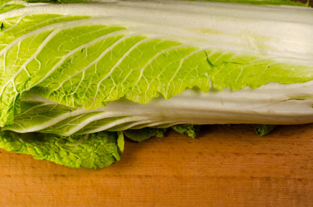 istock Chinese cabbage on a wooden table 638867728