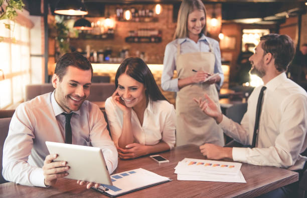istock Business people in cafe 638869524