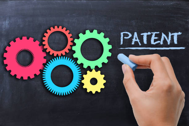 istock Industrial patent protection concept with gears on blackboard 638870730