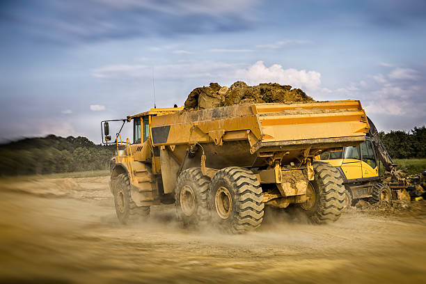istock Dump truck on a new highway construction S3, Poland 638872404
