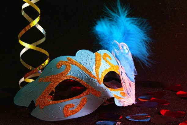 istock elegant venetian, mardi gras mask on glitter background 638872454