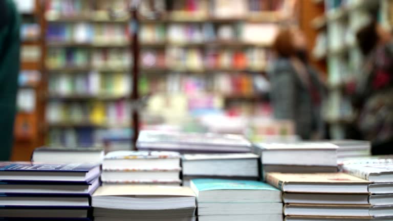 Concept learning and knowledge. Bookstore shelves with book stacks in bookstore