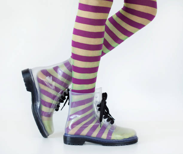 istock Woman stands with gumboots on white background 638875068
