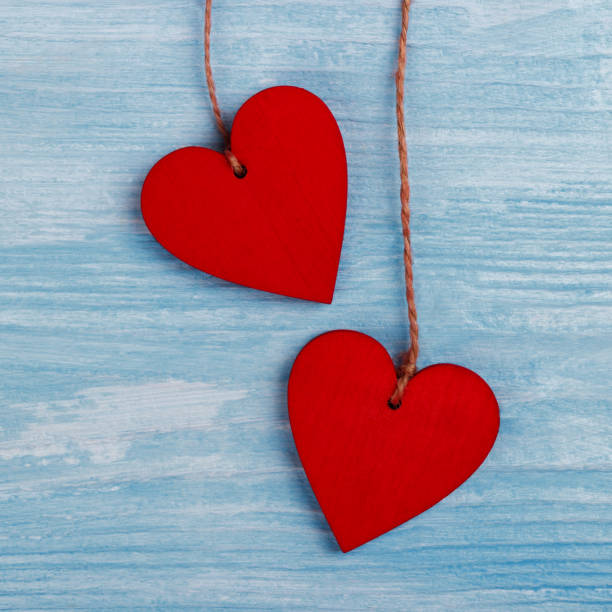 istock Two wooden hearts 638875262