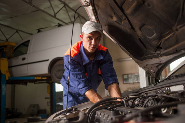 istock Car mechanic working in auto repair service 638877836