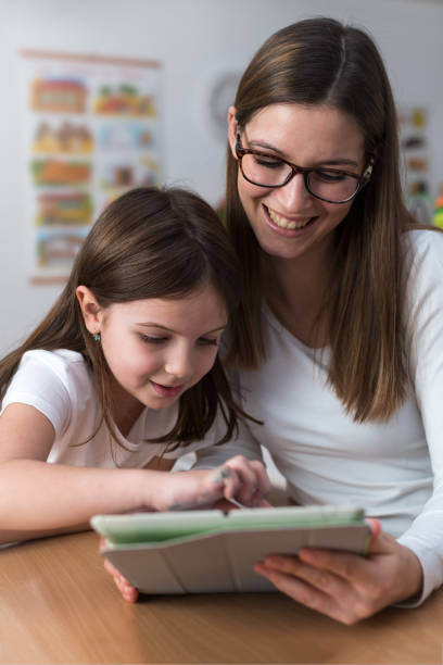 istock Mother and child with tablet indoors 638878500