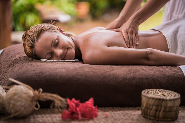 istock Relaxed woman enjoying in a back massage at the spa. 638878818