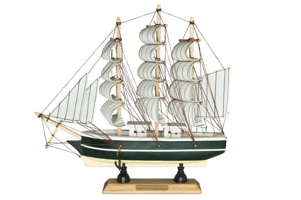 Ship Sailboat Wooden Model Figurine on a White Background