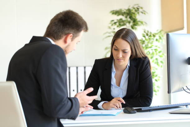 istock Salesman trying to convince to a doubtful client 638882738