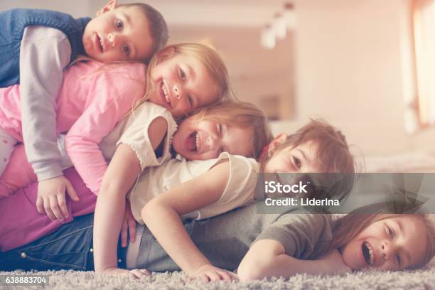 Children Having Fun At Home Stock Photo - Download Image Now - Community, Preschool, Boys