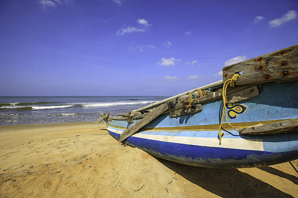 istock old traditional catamaran on the beach 638884606