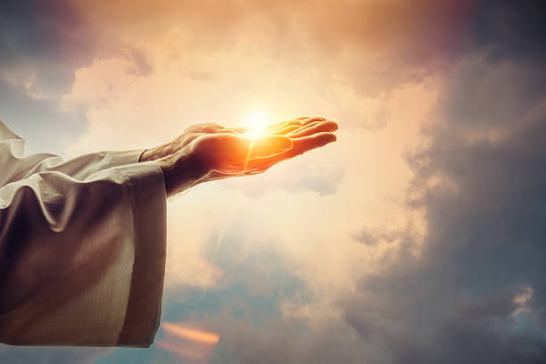 Blessing Male hands holding sunlight apostle worshipper photos stock pictures, royalty-free photos & images