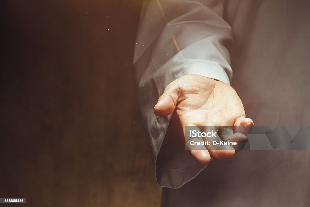 Hand Male hand reaching out Jesus Christ Stock Photo