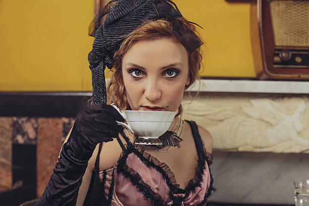 istock Tea time  Old fashioned young women  drinking tea  Retro party 638886326