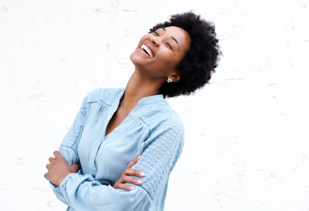istock Cheerful young african woman against white background 638886920