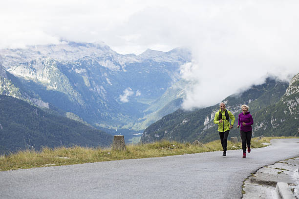 istock Senior couple hiking on road 638888872